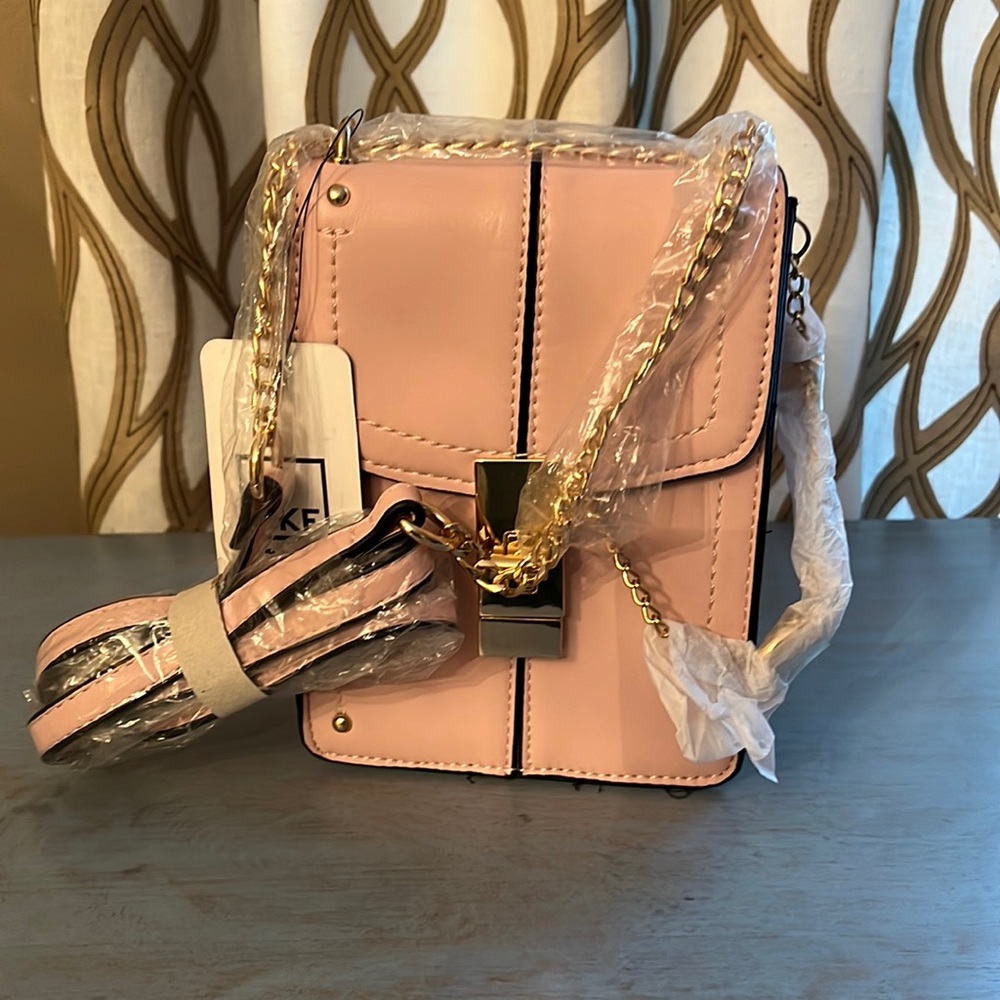 NWT MK Boutique pink vegan crossbody handbag.